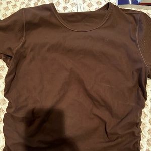 Lululemon cropped top with ruching on the sides.